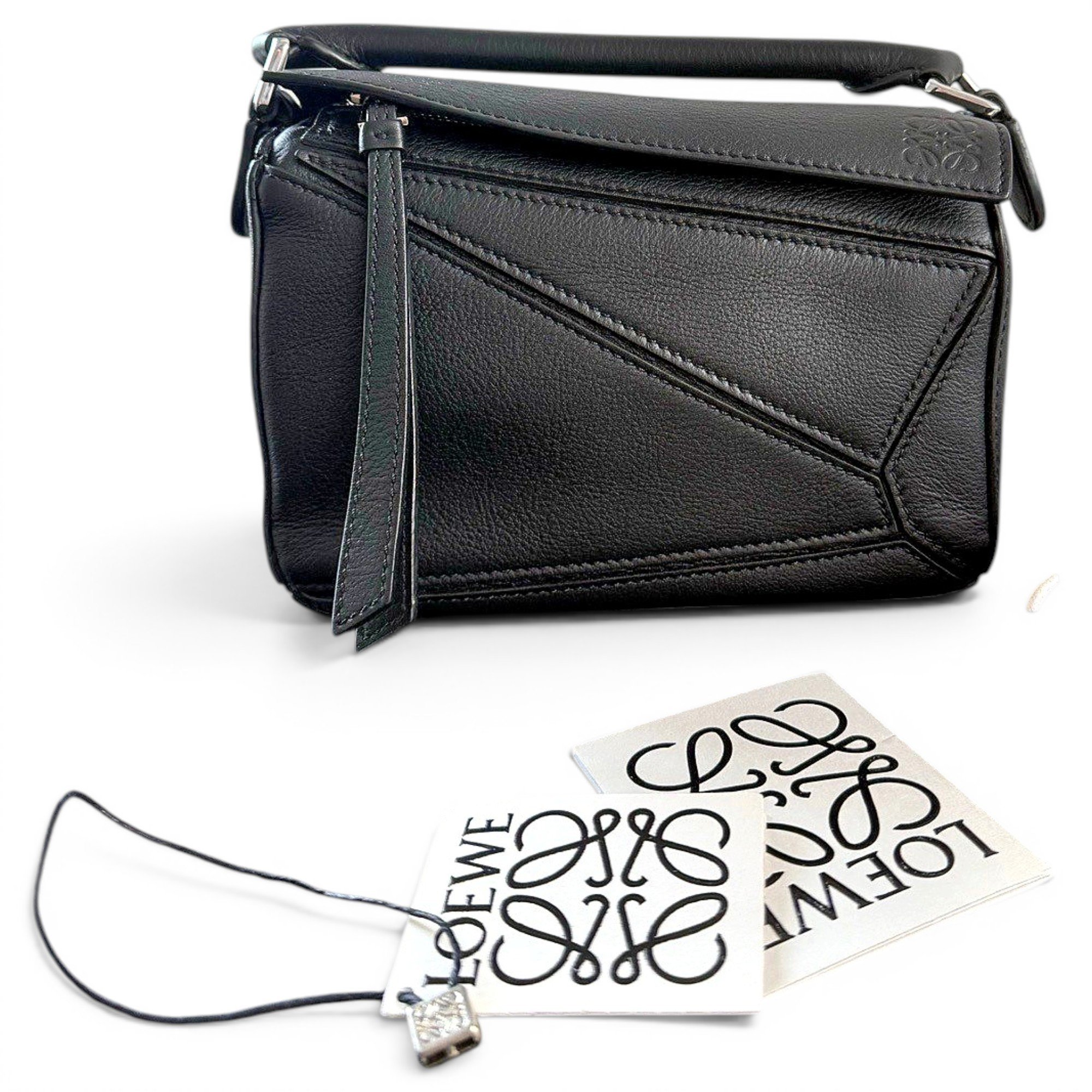 Puzzle leather handbag