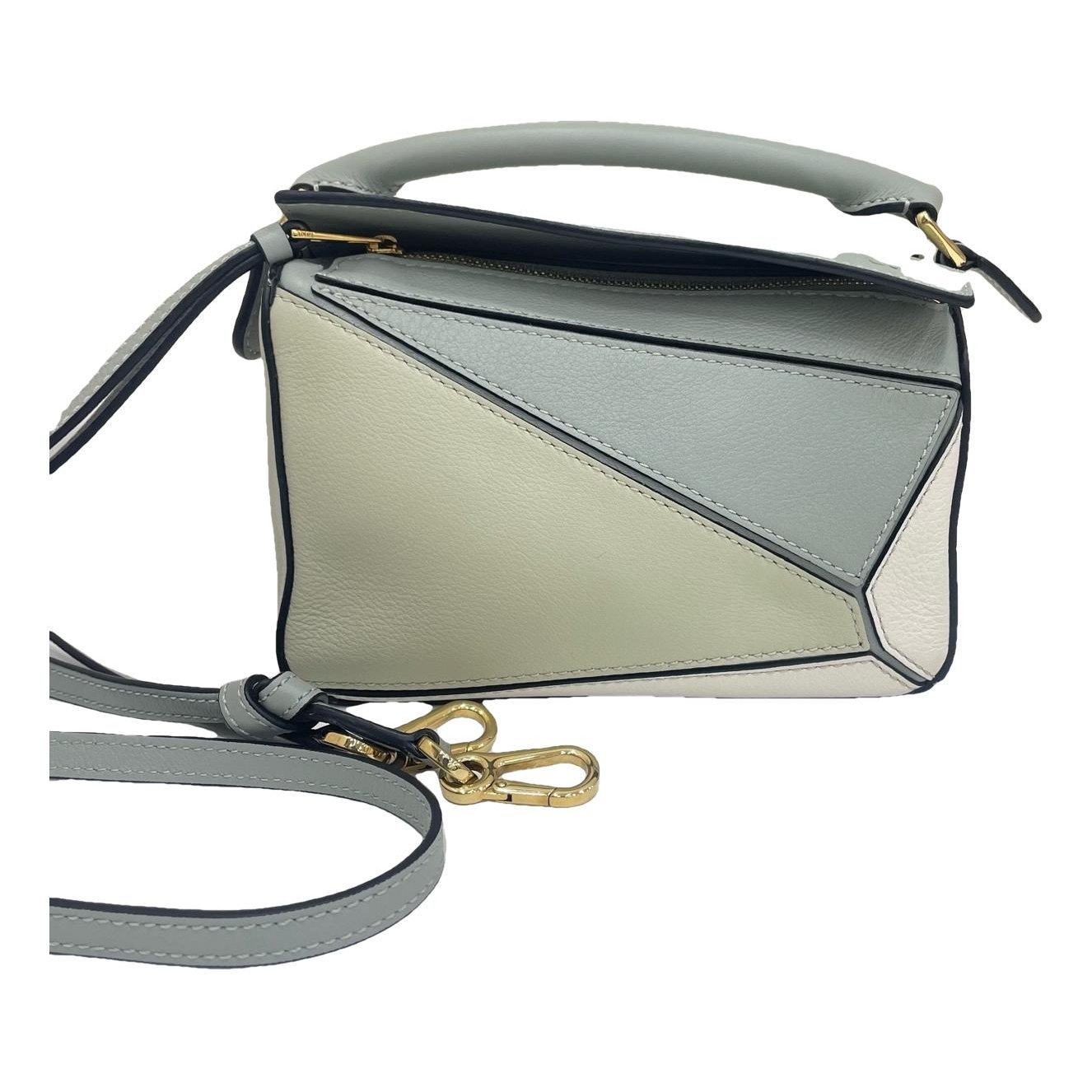 Puzzle leather handbag