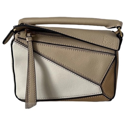 Puzzle leather handbag