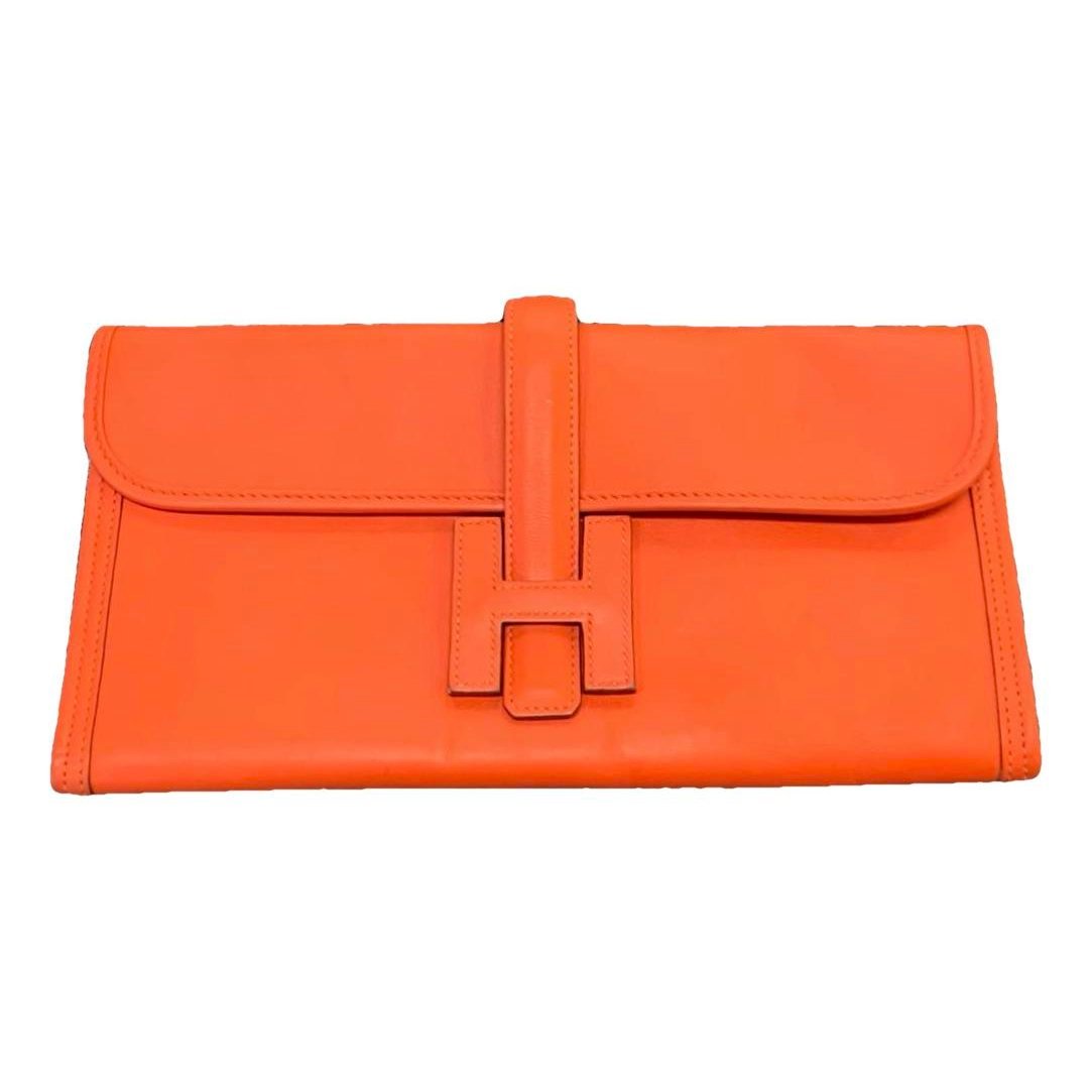 Jige leather clutch bag