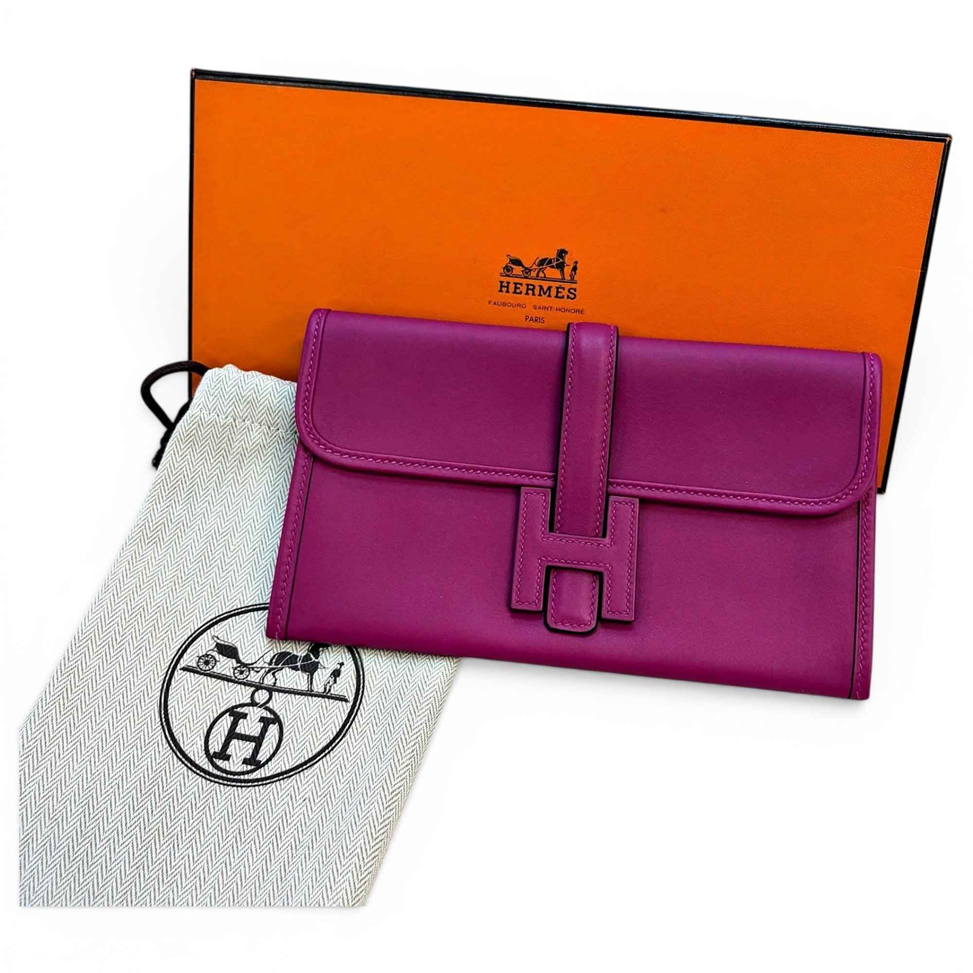 Jige leather clutch bag