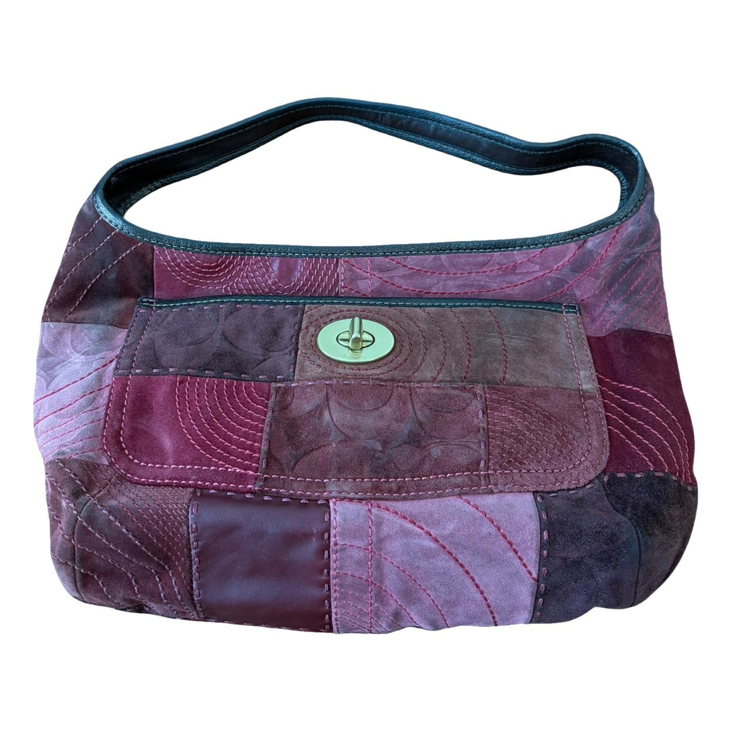Signature Sufflette handbag