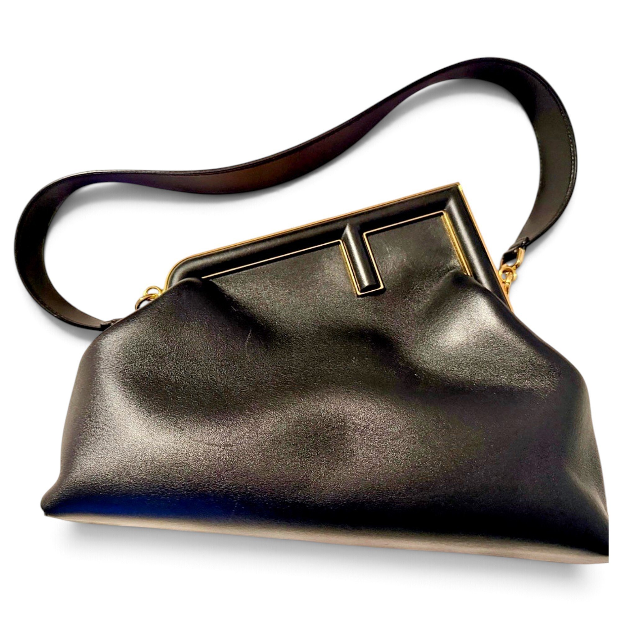 First leather handbag