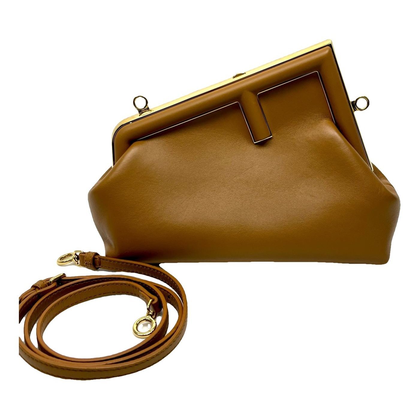 First leather handbag