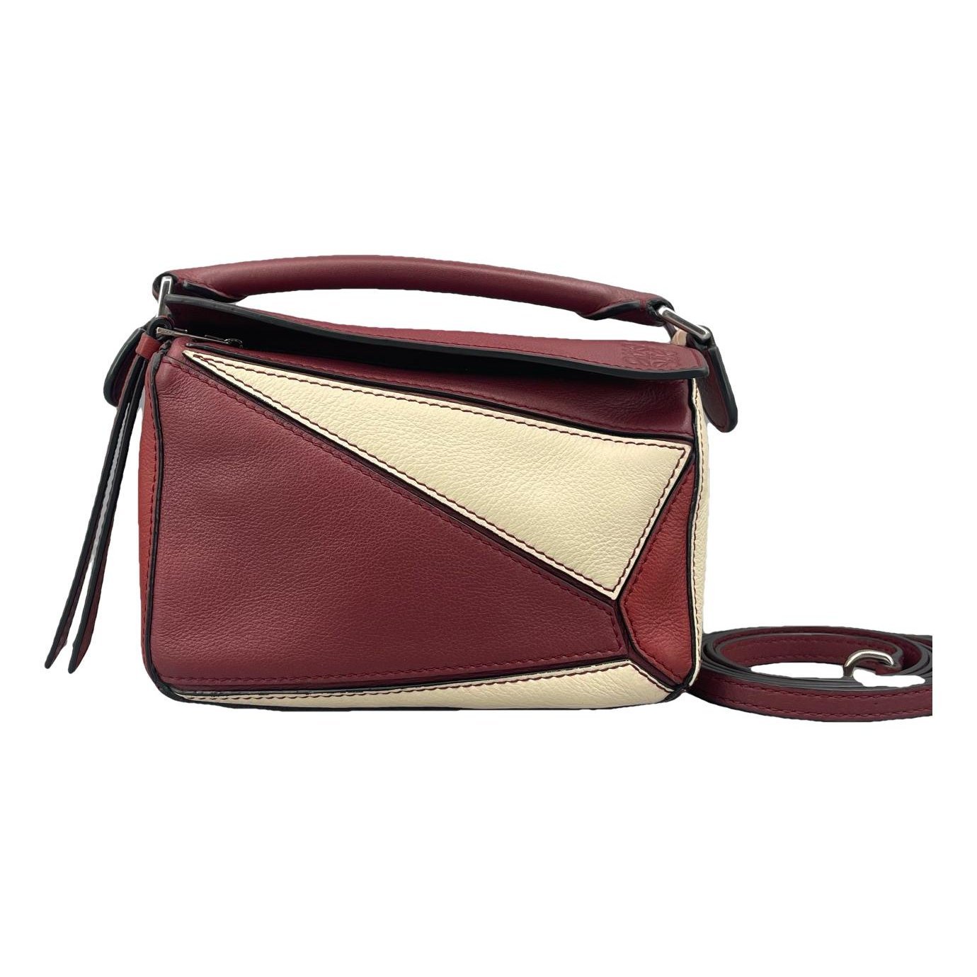 Puzzle leather handbag