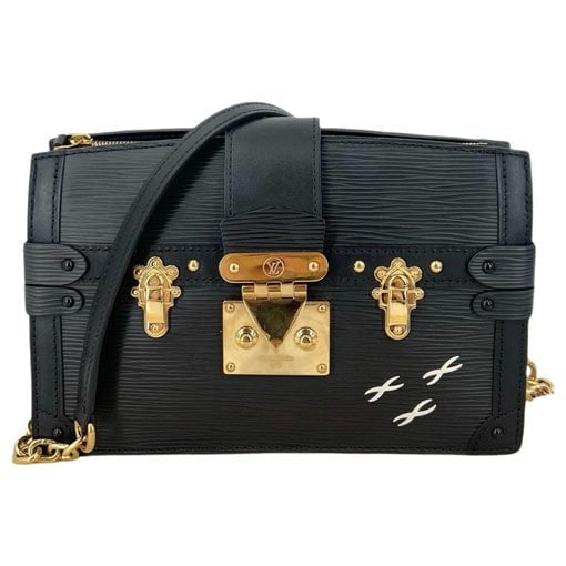 Pochette Trunk leather handbag