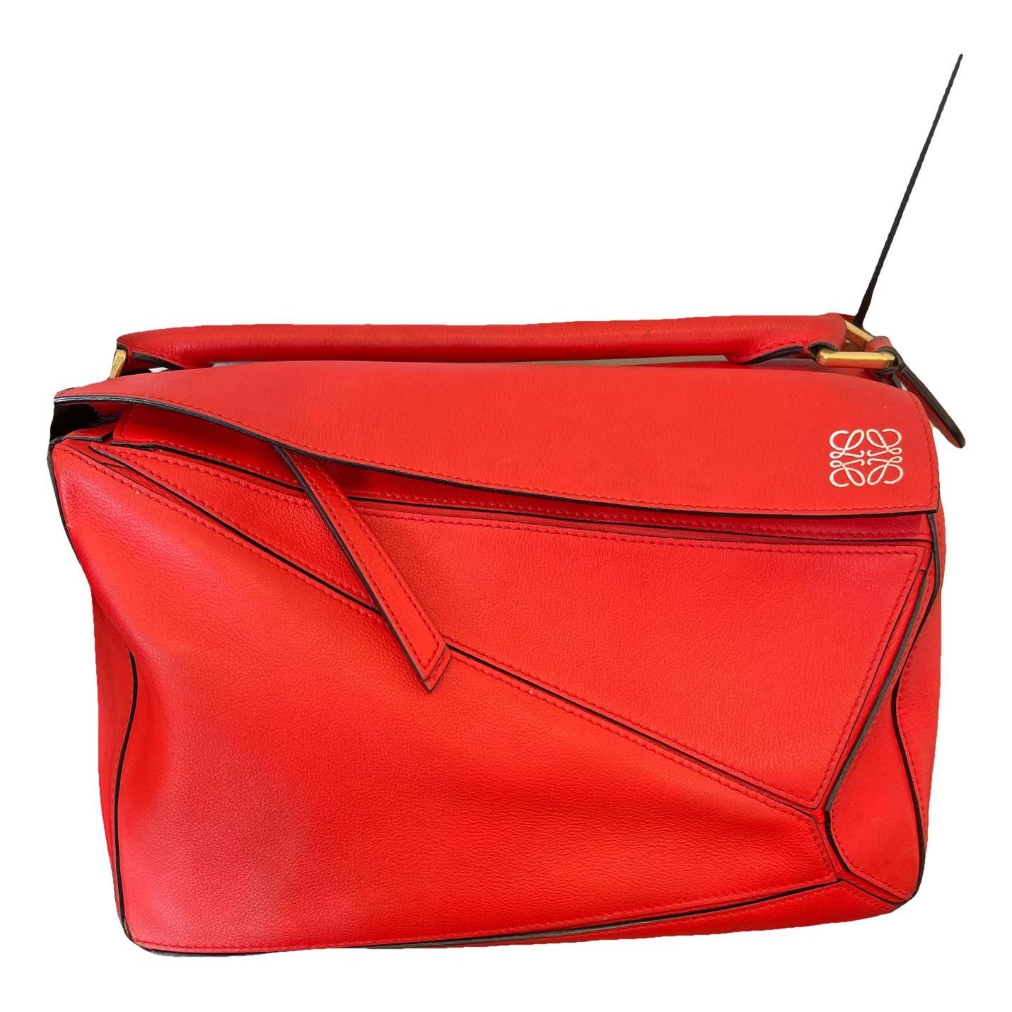 Puzzle leather handbag