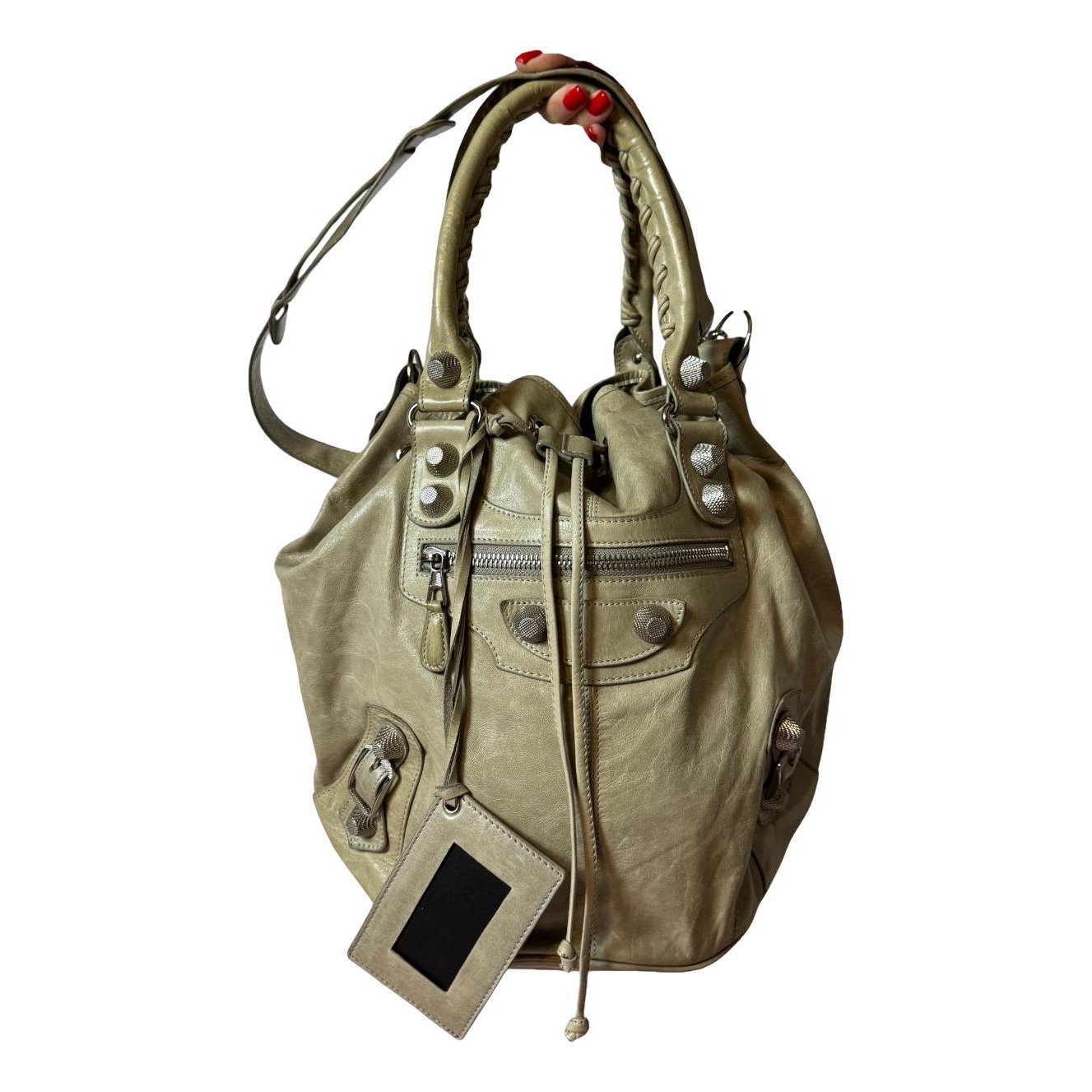 Pompon leather bag