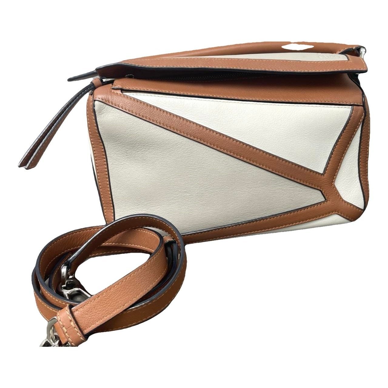 Puzzle leather handbag