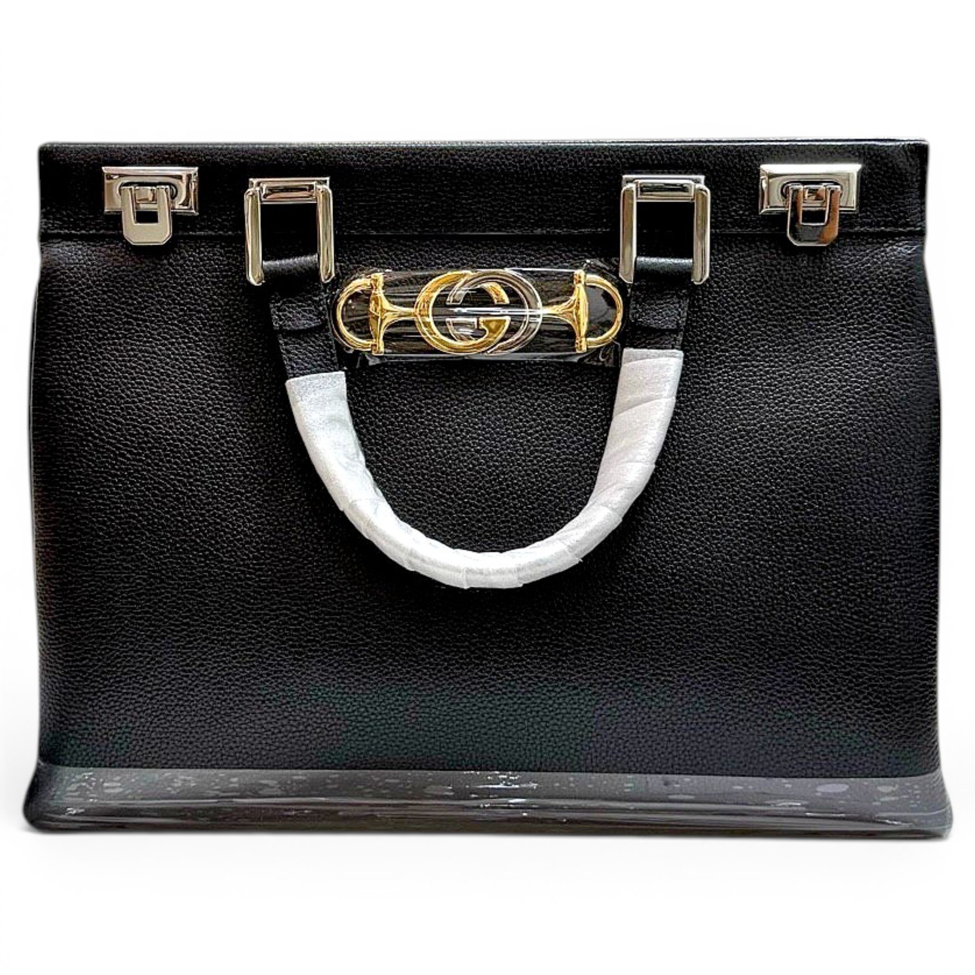Zumi leather handbag