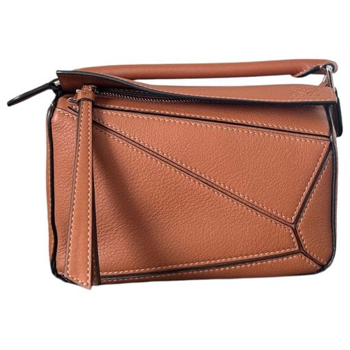 Puzzle leather handbag