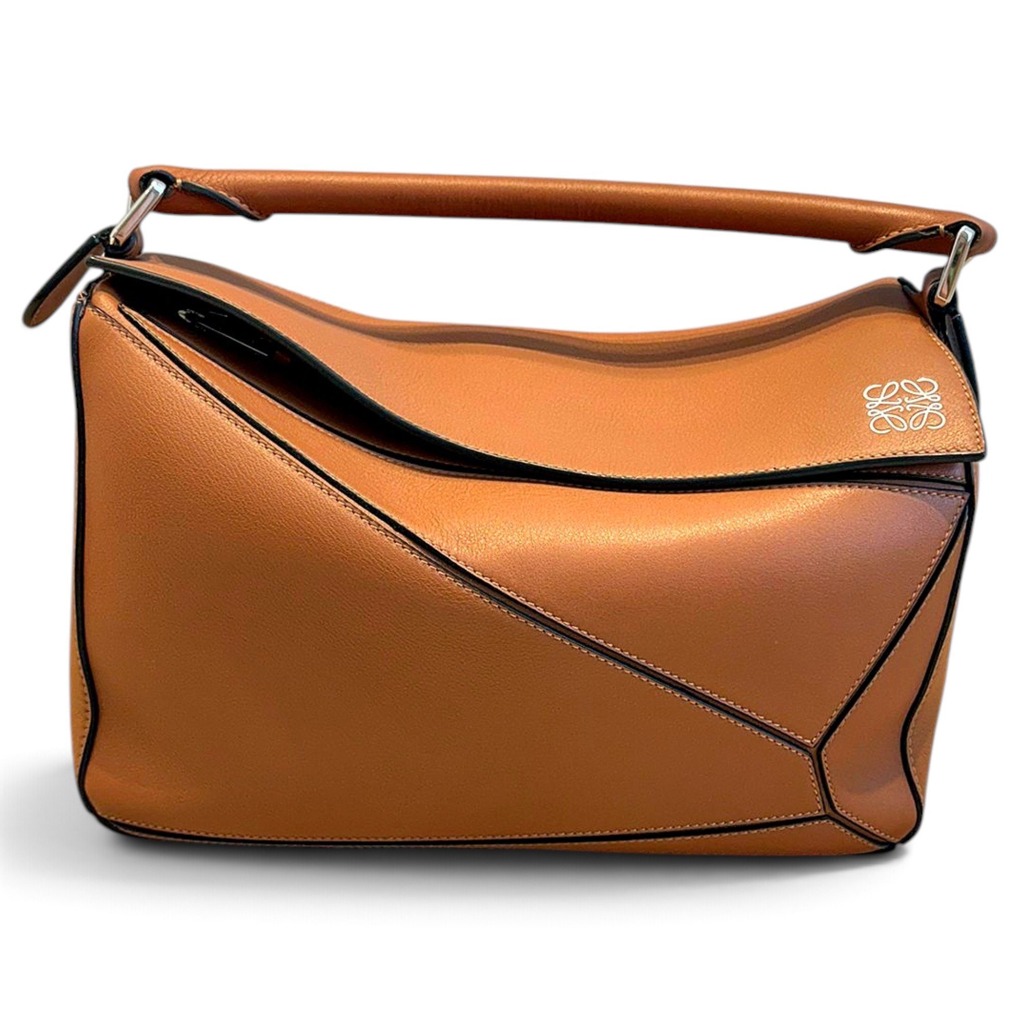 Puzzle leather handbag