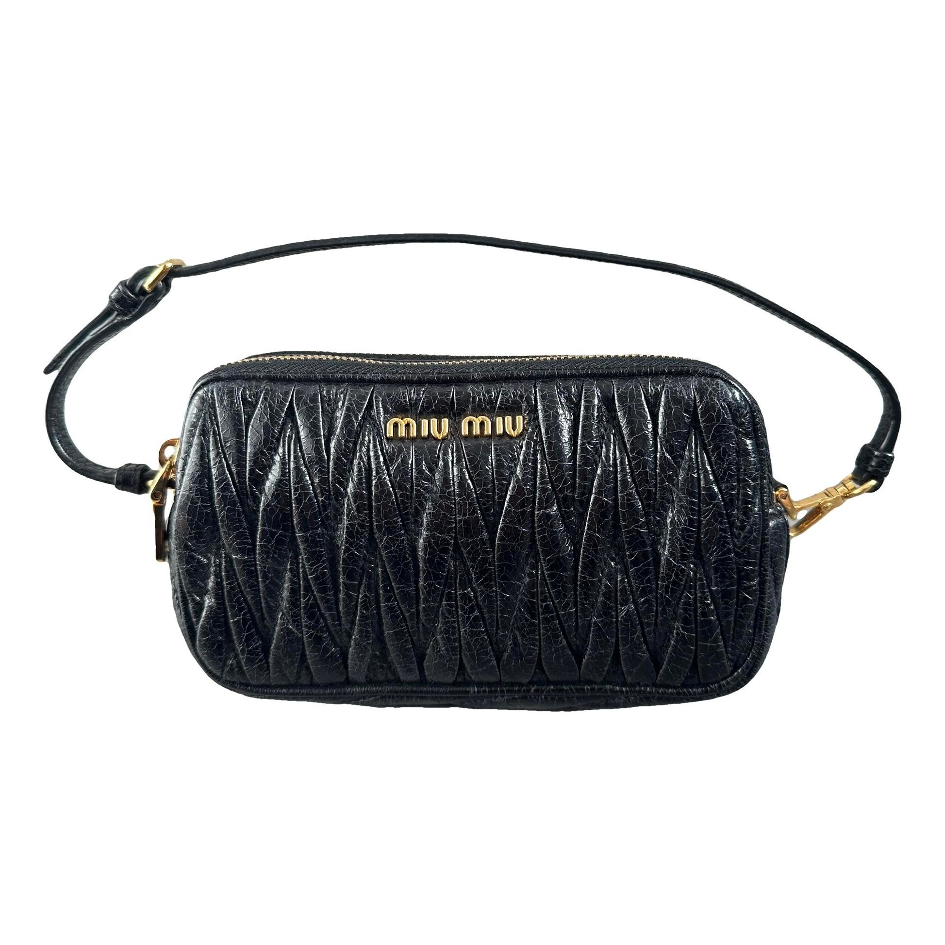 Matelassé leather clutch bag
