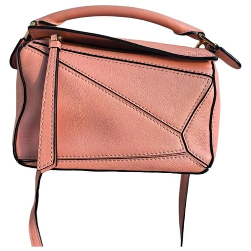 Puzzle leather crossbody bag