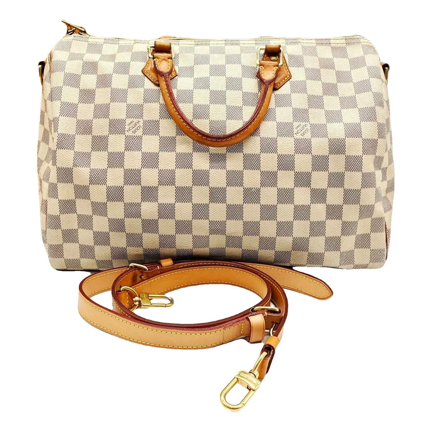 Speedy vinyl crossbody bag