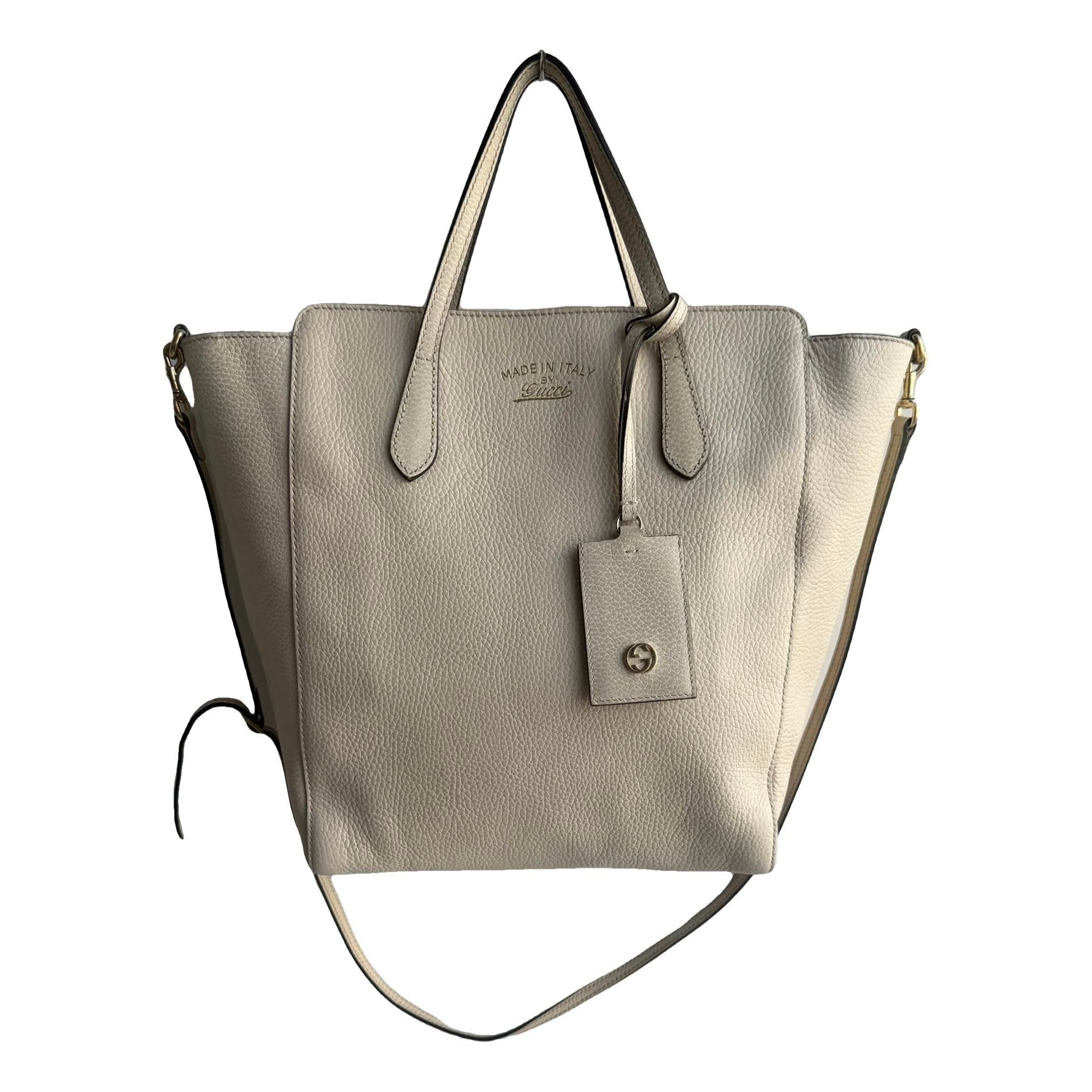 Swing leather crossbody bag