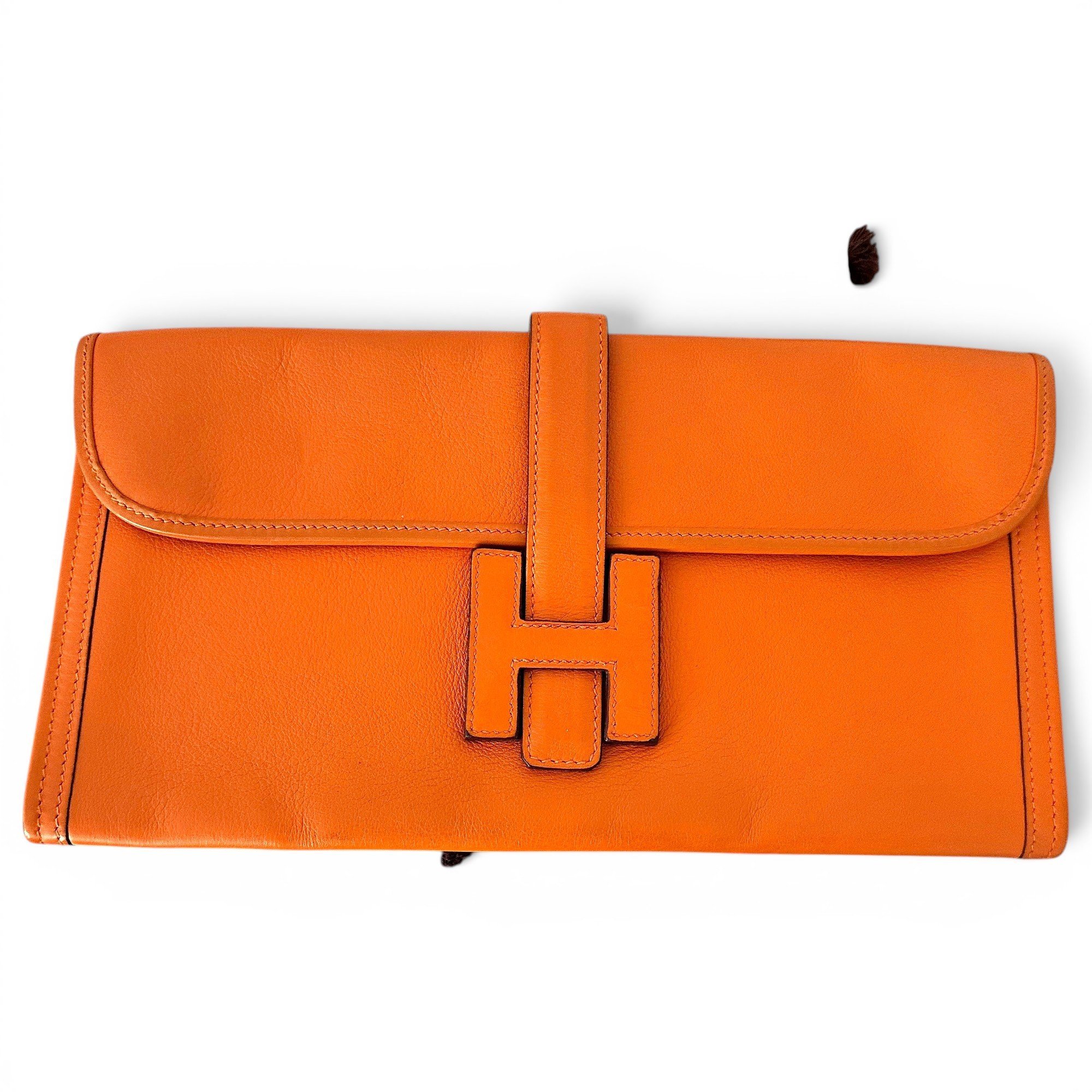 Jige leather clutch bag