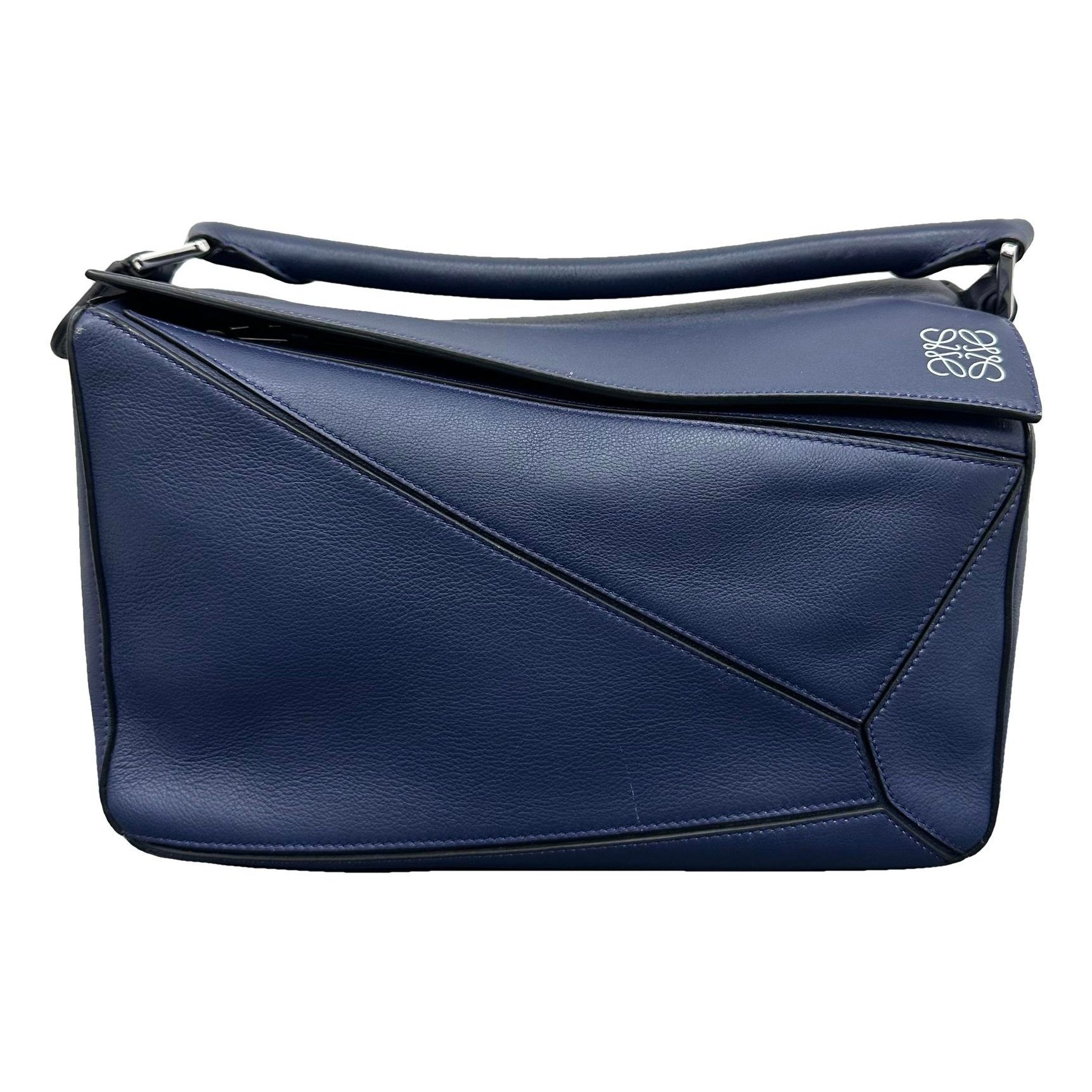 Puzzle leather handbag