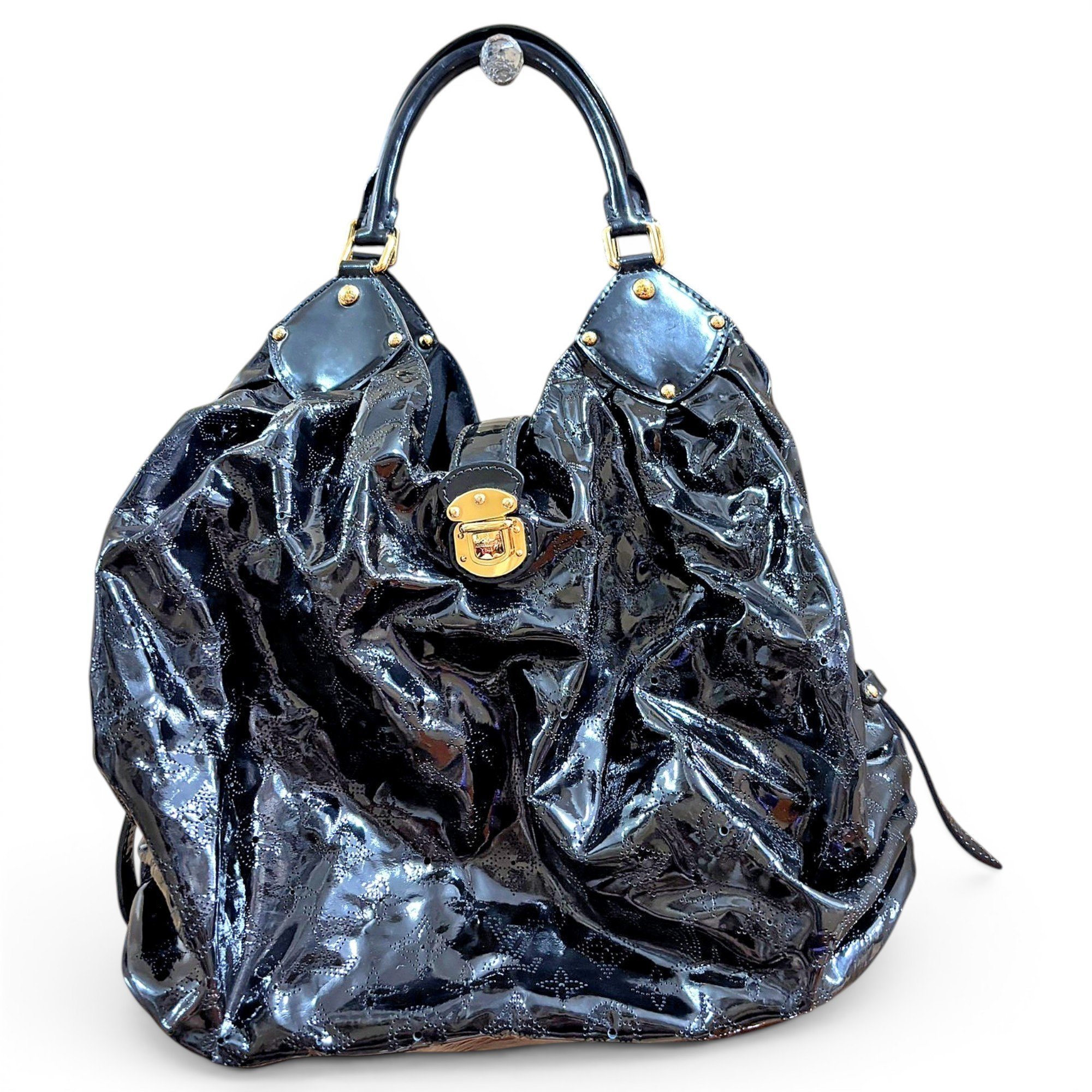 Surya patent leather handbag