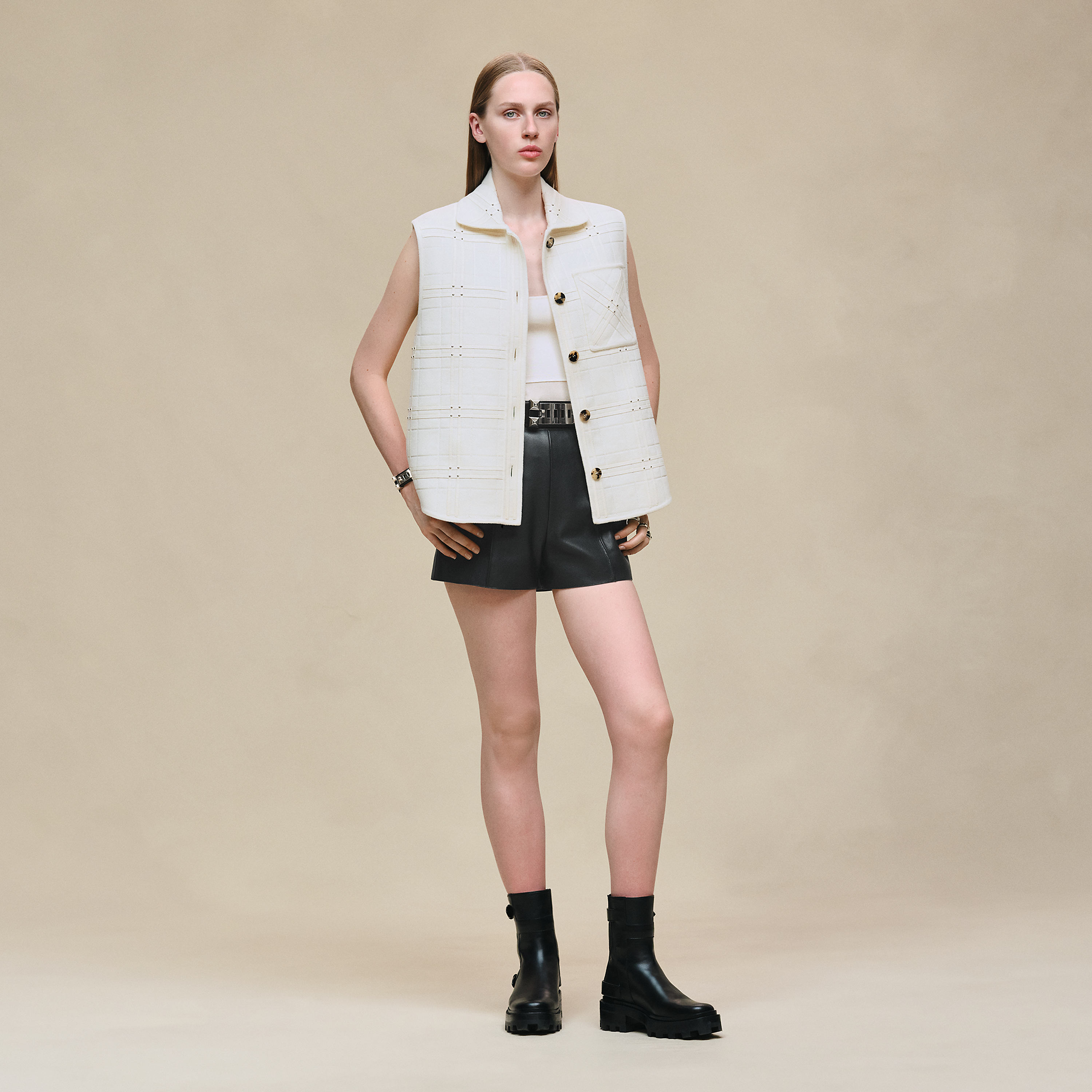 Embroidered short vest with leather detail