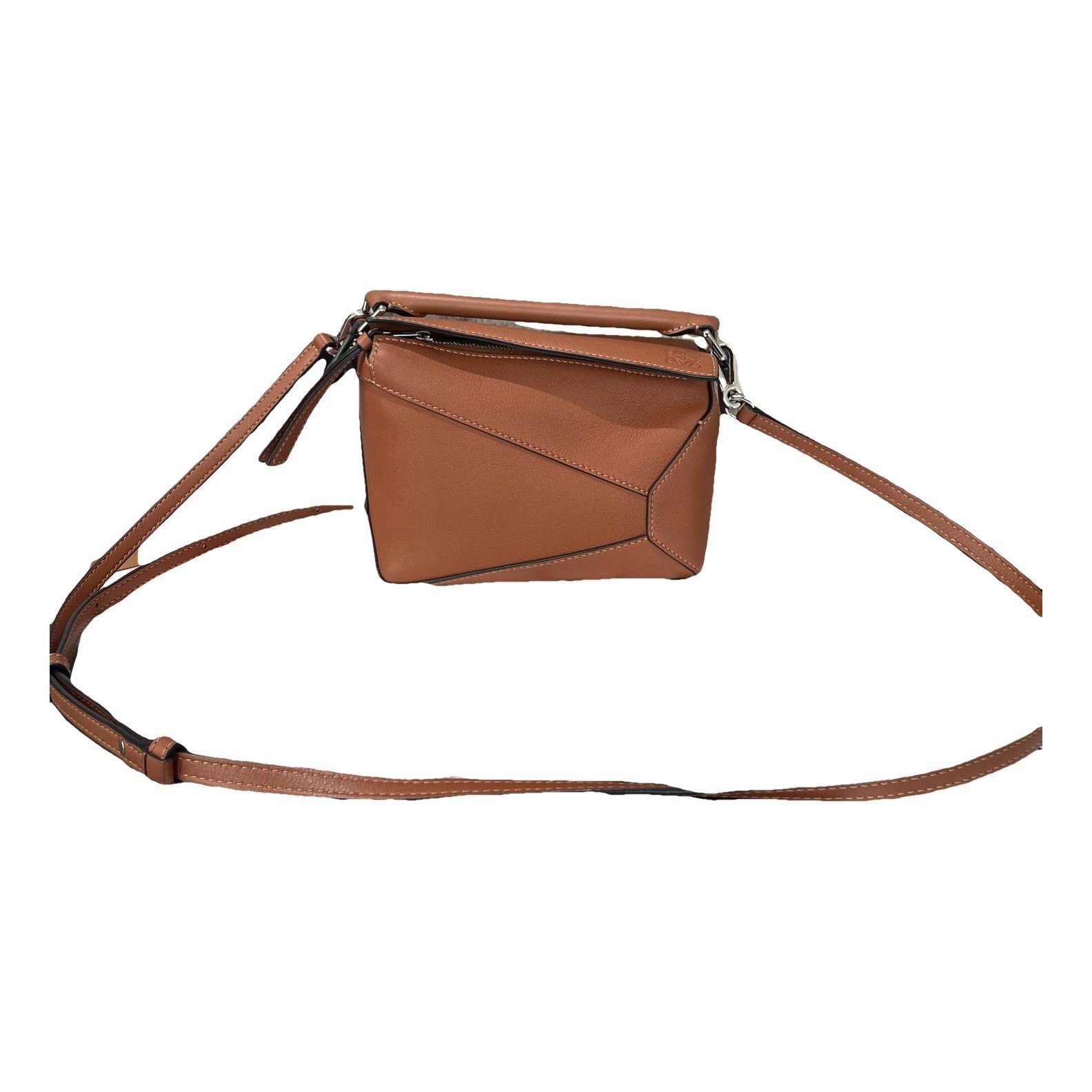 Puzzle leather handbag