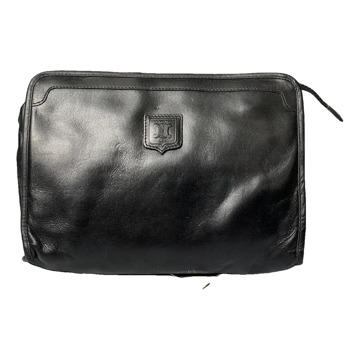 Triomphe Vintage leather clutch bag
