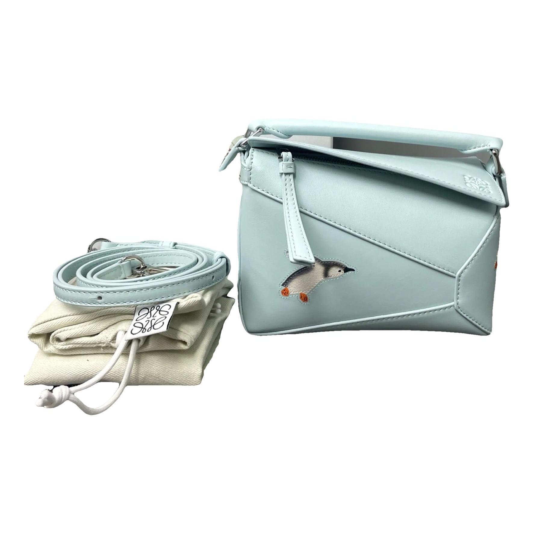 Puzzle leather handbag