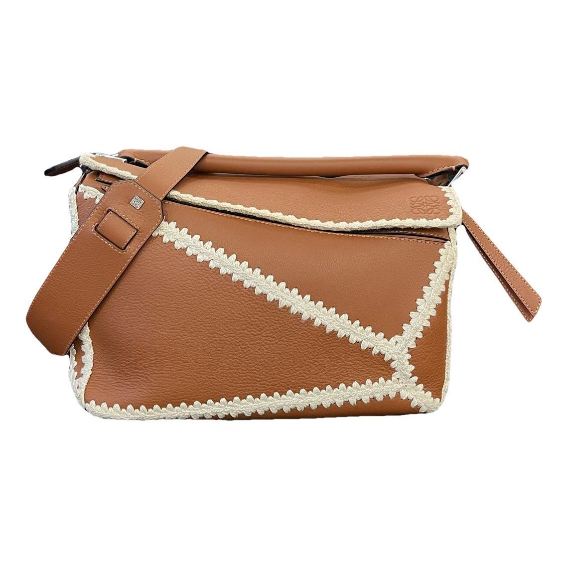 Puzzle leather handbag