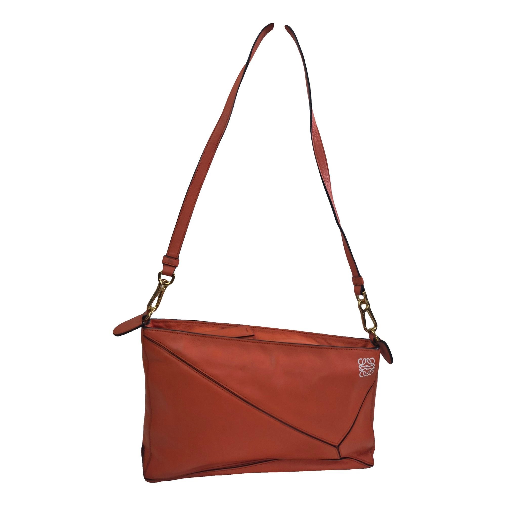 Puzzle leather clutch bag