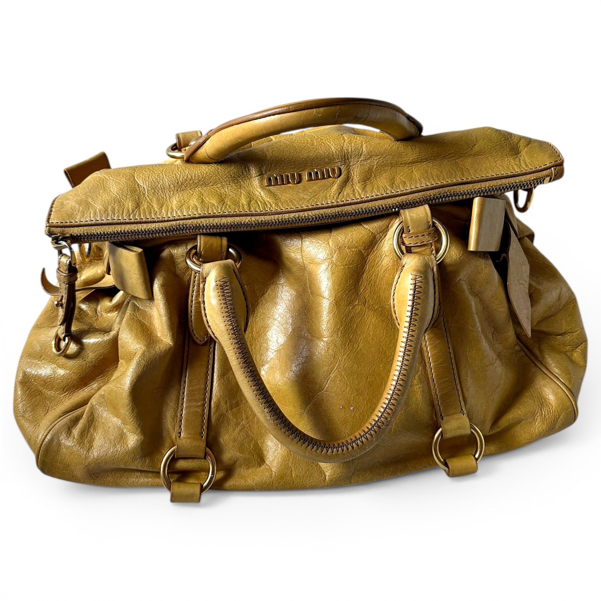 Bow bag leather handbag