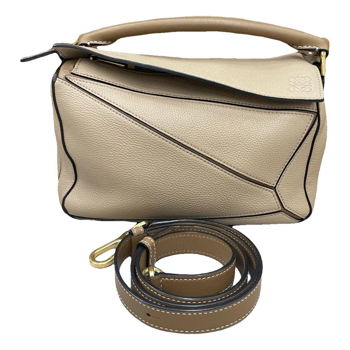 Puzzle leather handbag