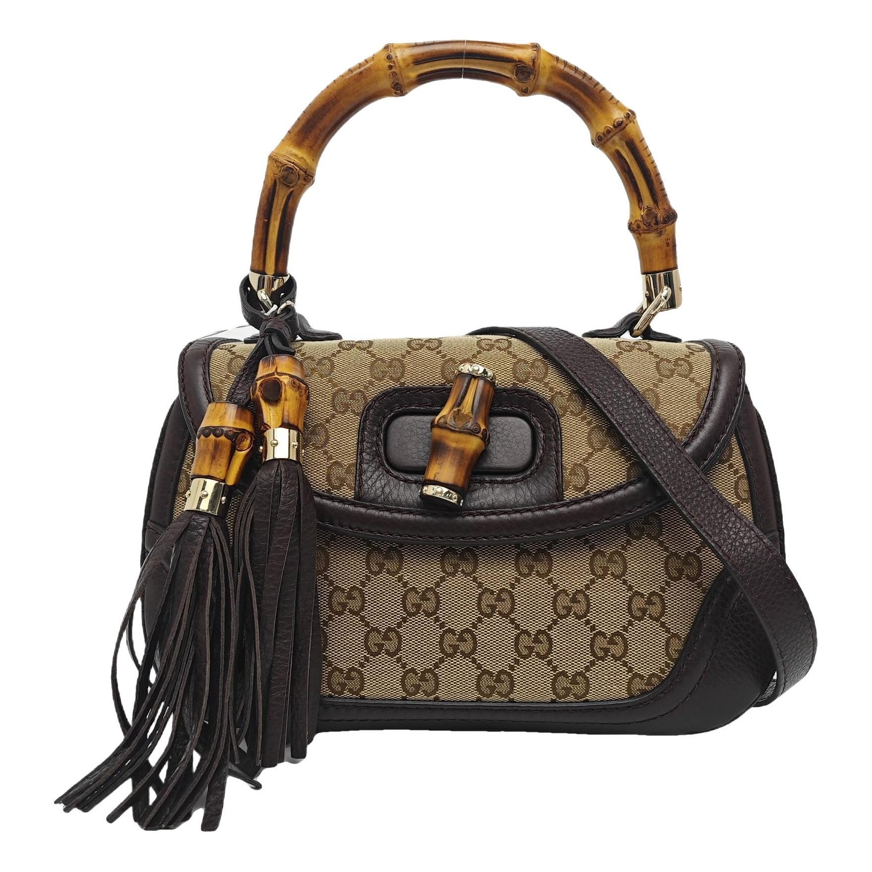 Convertible Pompon Bamboo Top Handle cloth handbag