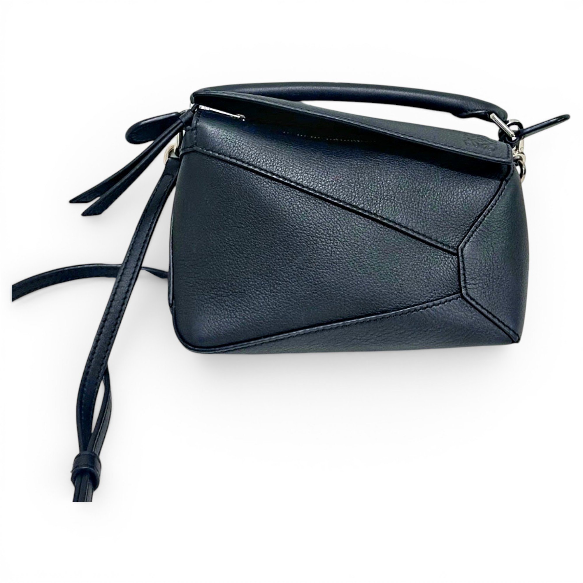 Puzzle leather handbag