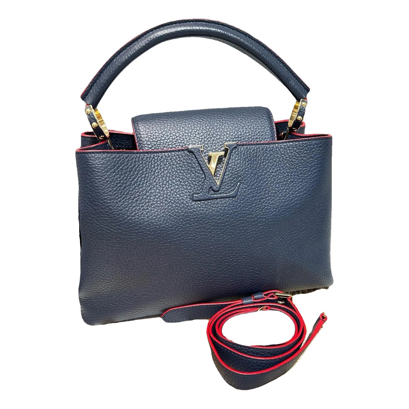 Capucines pony-style calfskin handbag