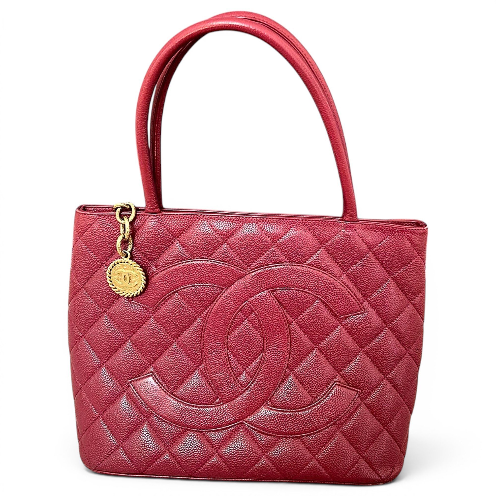 Médaillon leather handbag
