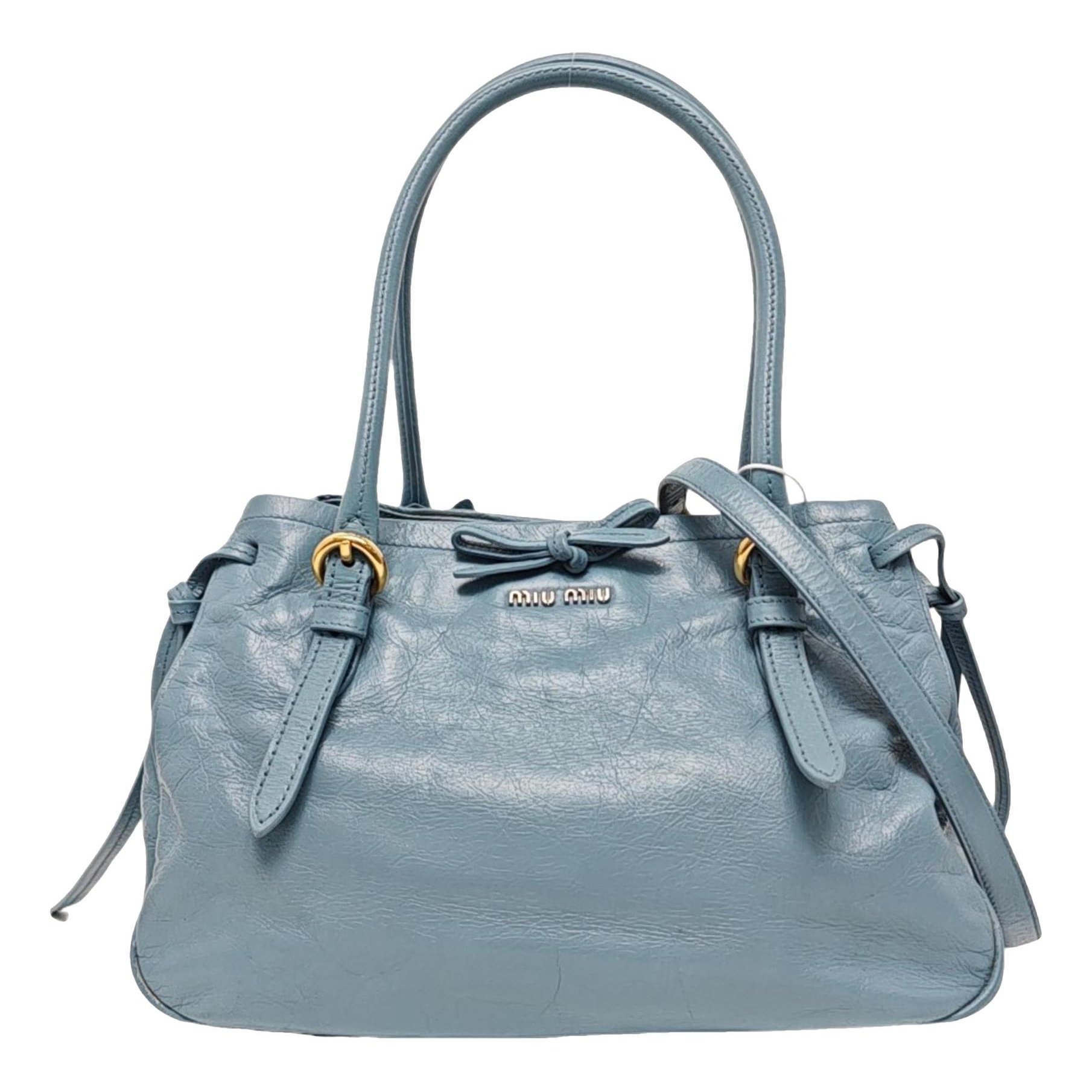 Bow bag leather handbag