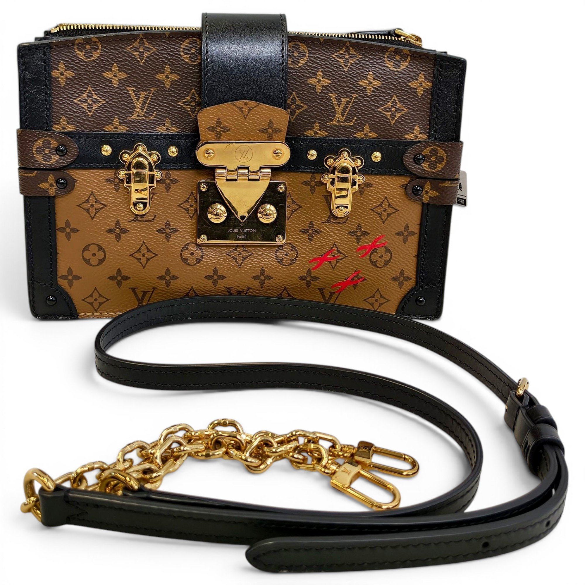 Pochette Trunk leather handbag