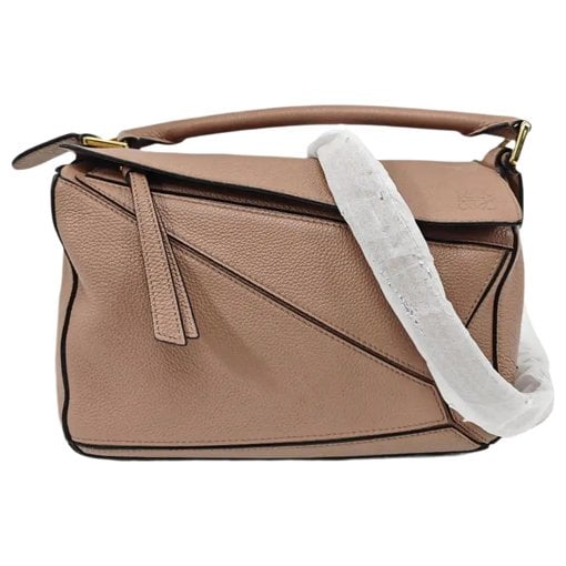Puzzle leather handbag