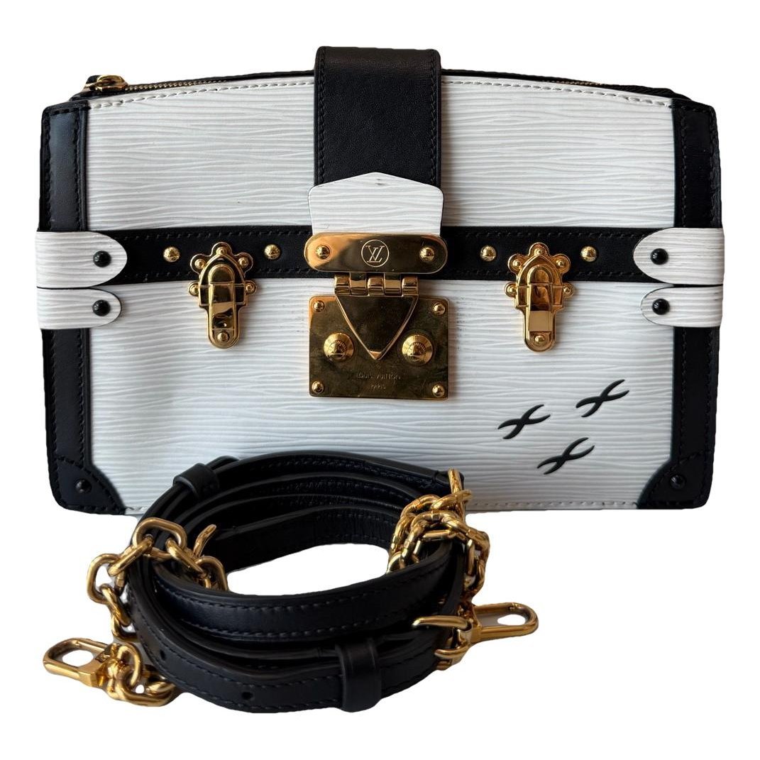 Pochette Trunk leather handbag