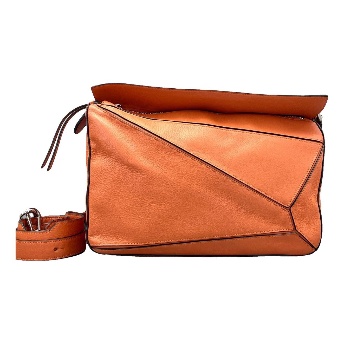 Puzzle leather handbag