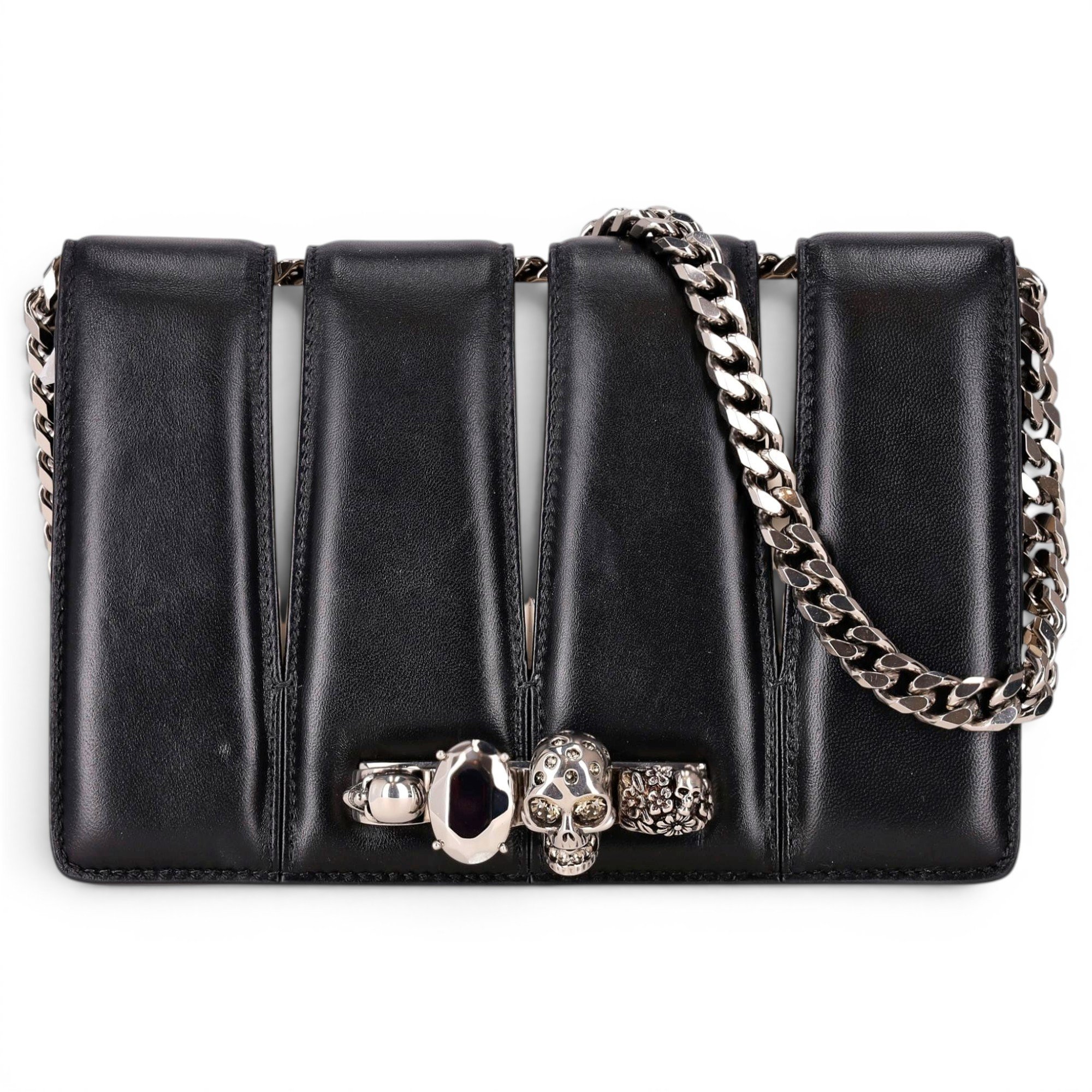 Knuckle leather clutch bag