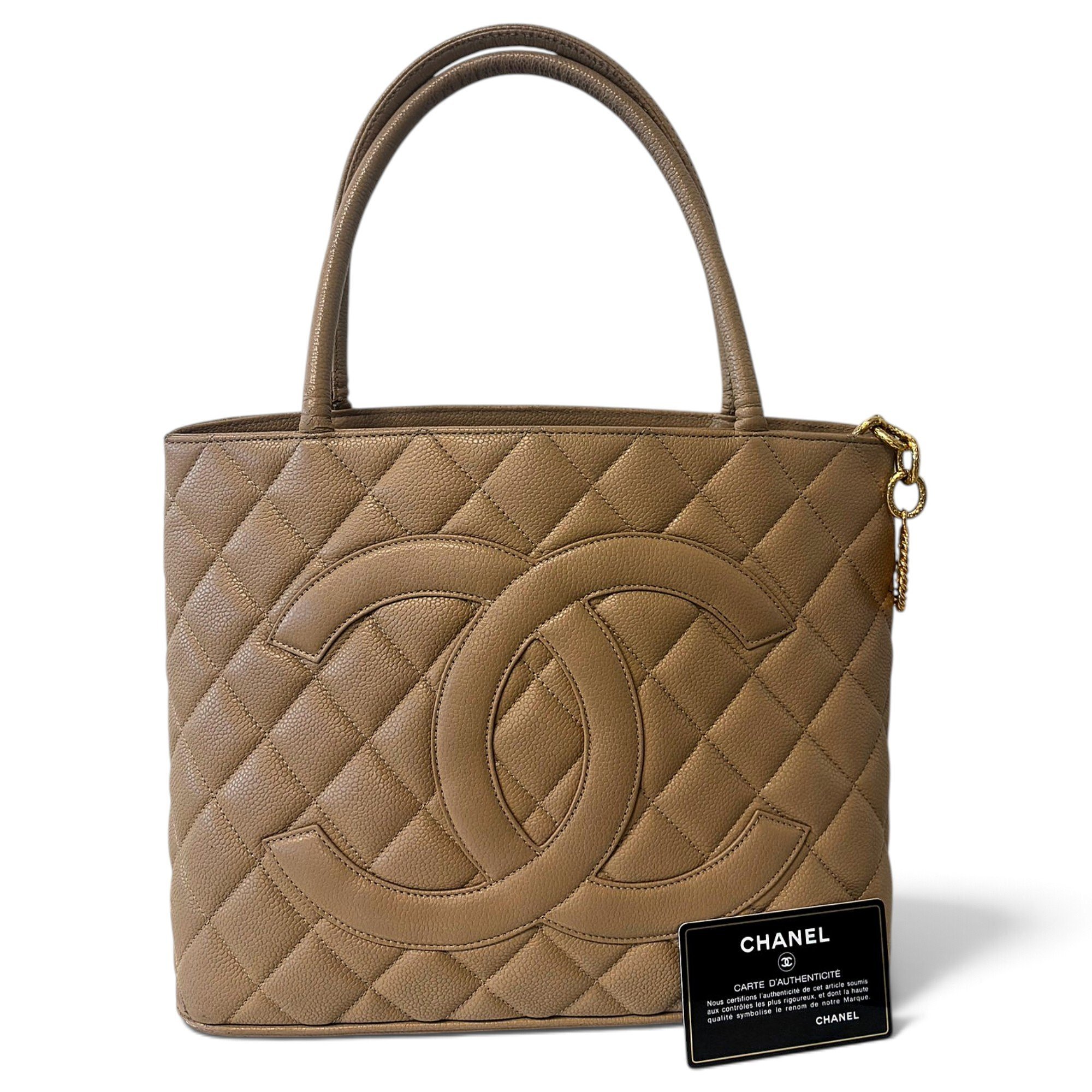 Médaillon leather handbag