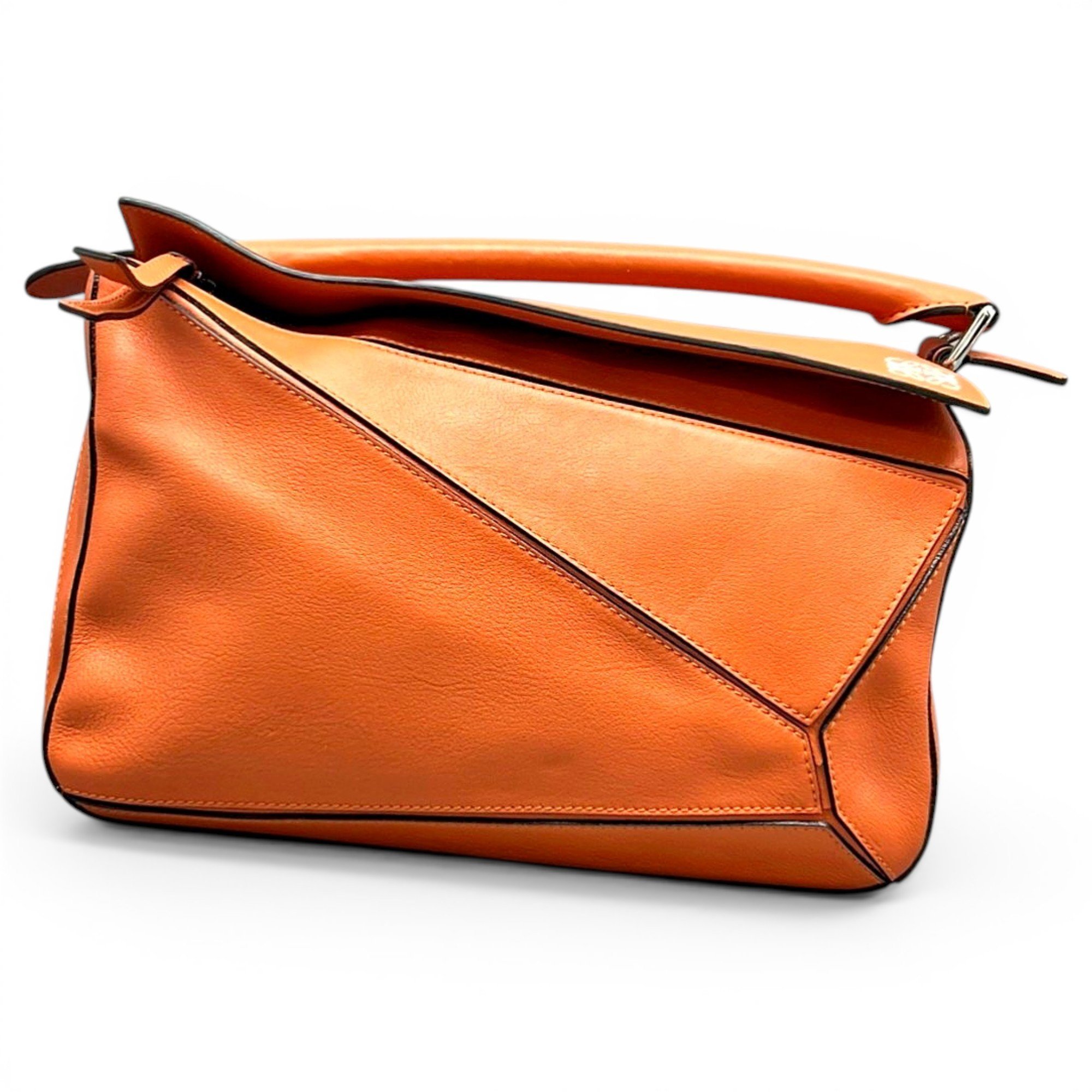 Puzzle leather handbag