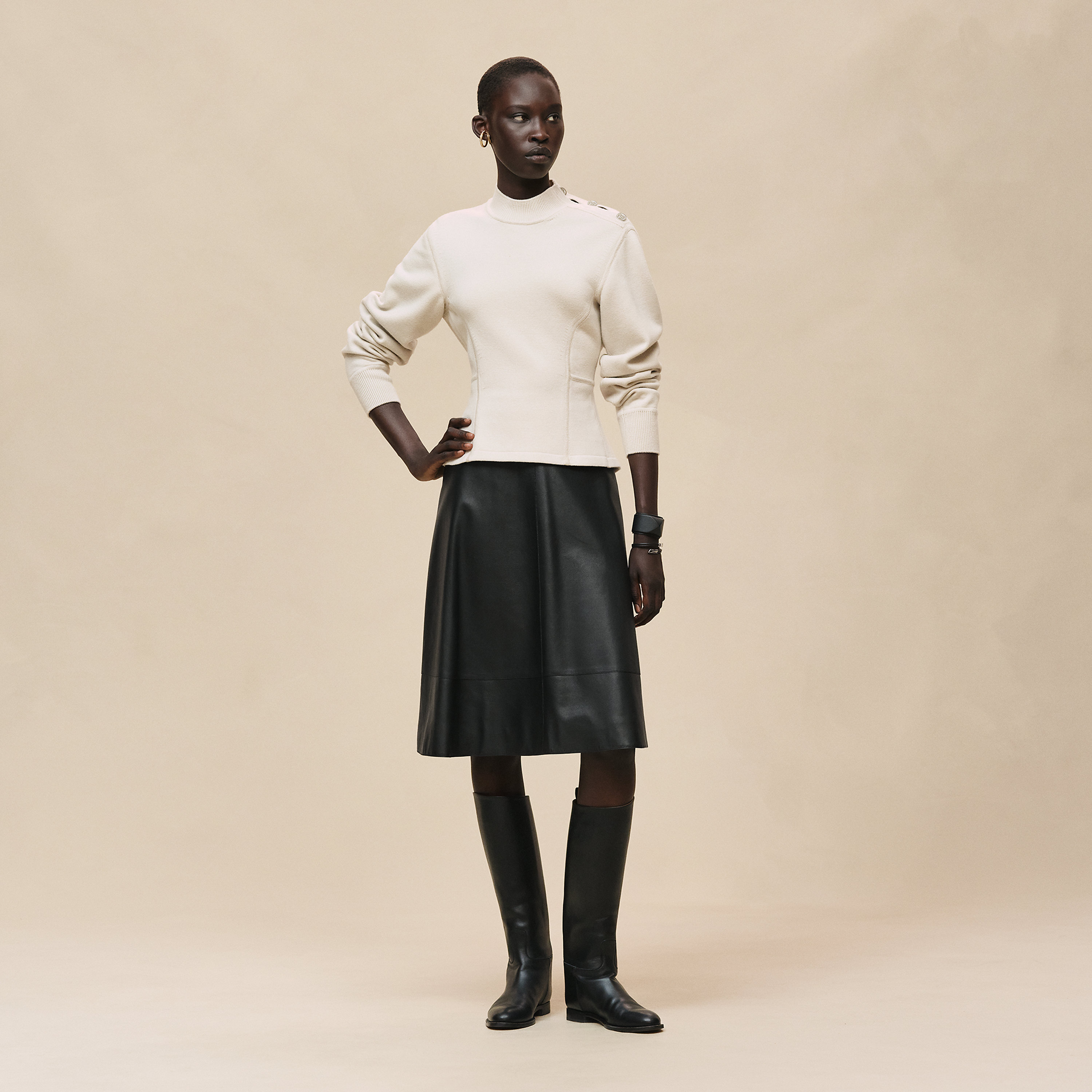 Buttoned sweater with "Ferronnerie" details