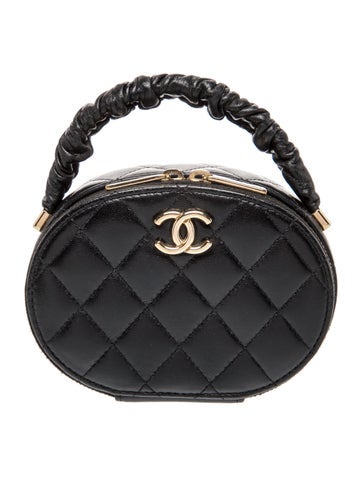 Ruched Oval Top Handle Vanity Bag