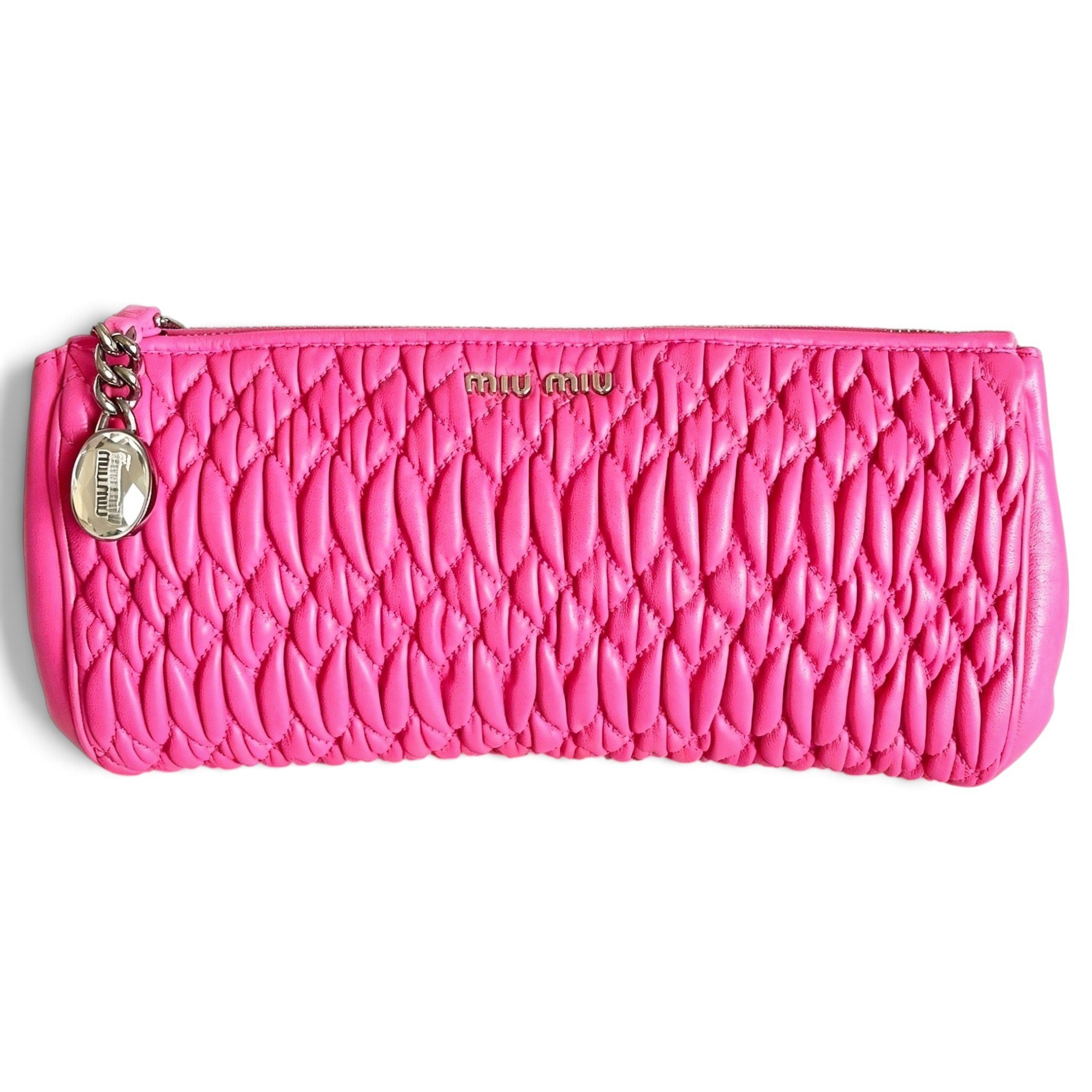 Miu Crystal leather clutch bag