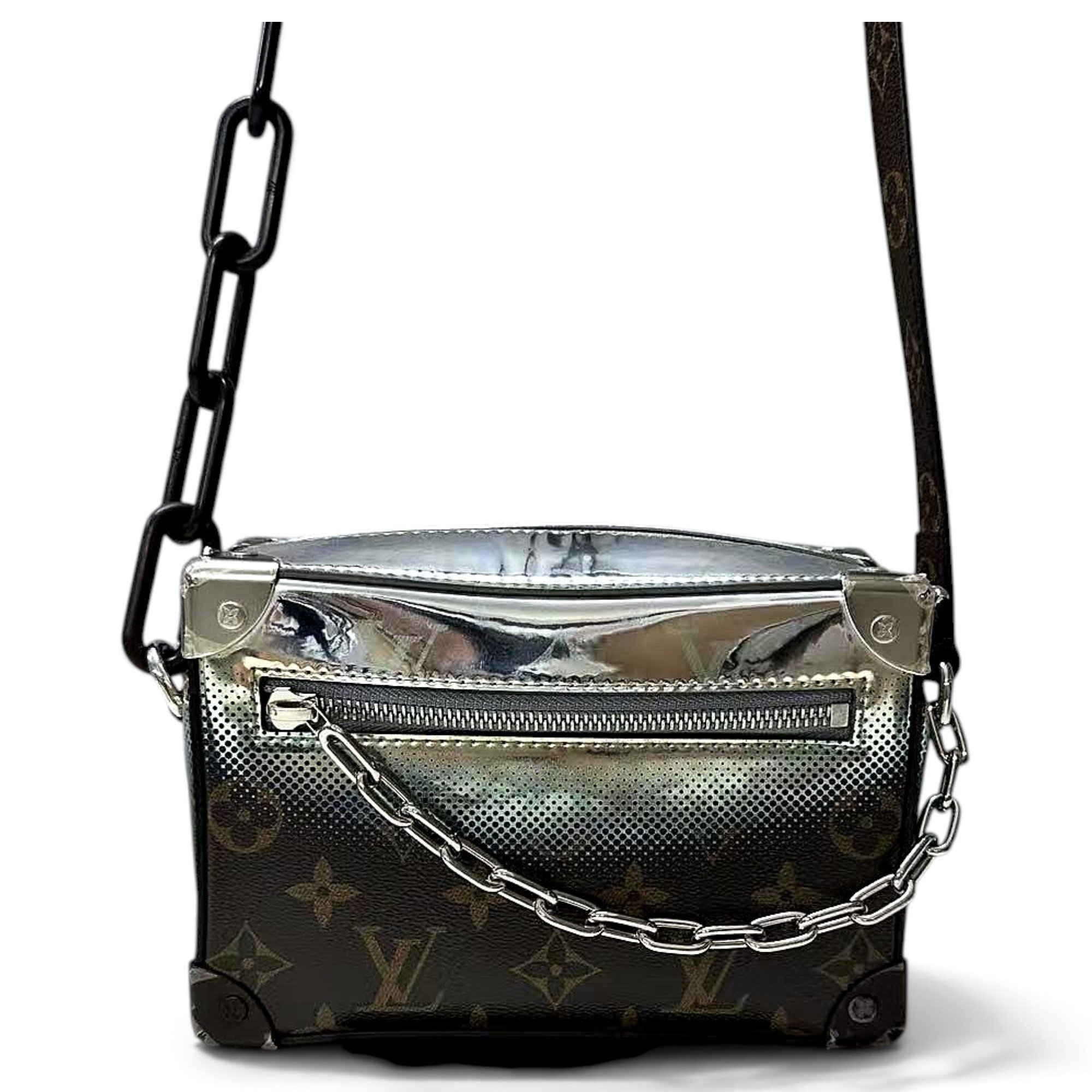 Pochette Trunk leather handbag