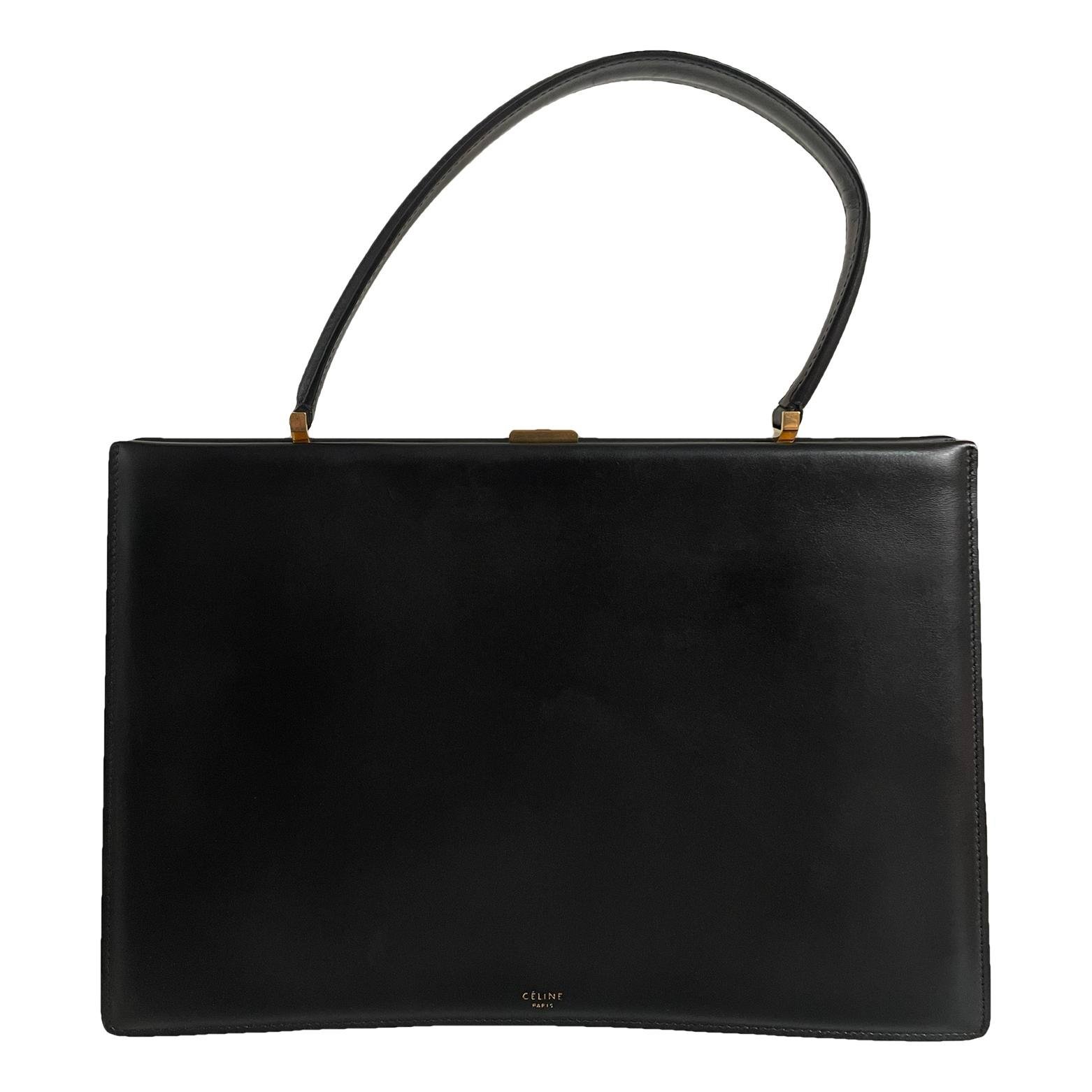 Clasp leather handbag