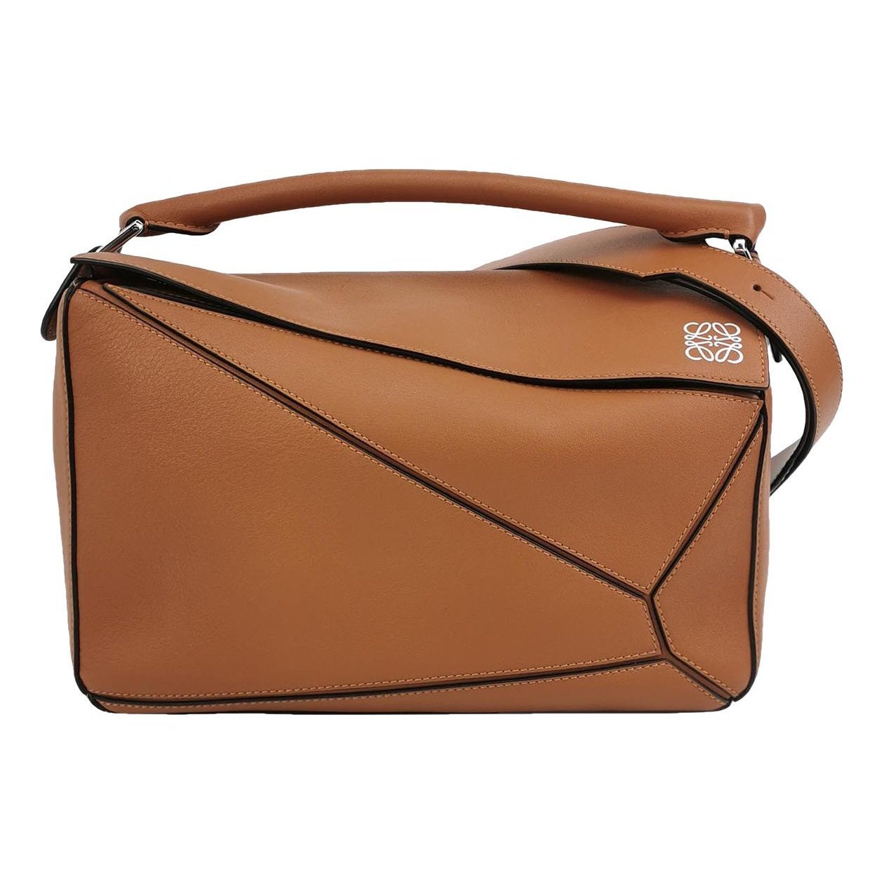 Puzzle leather handbag