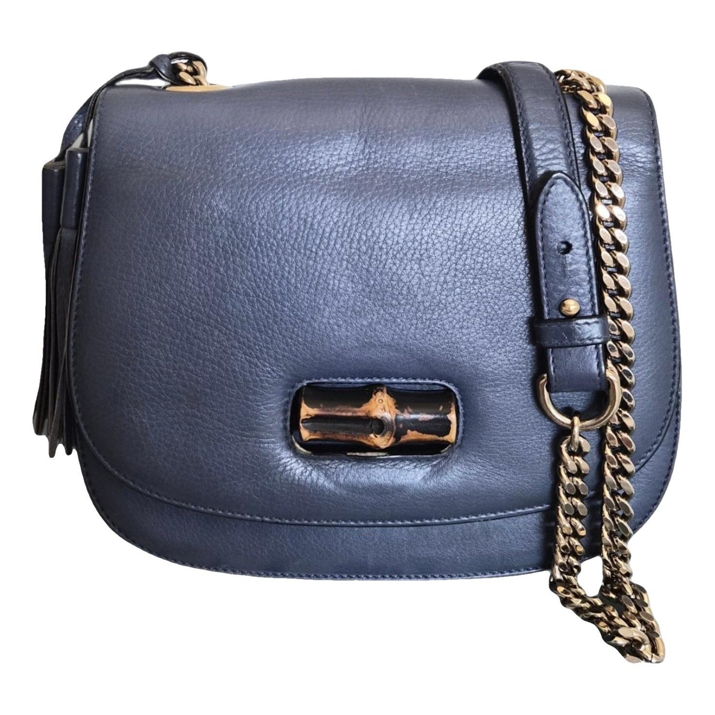 Convertible Pompon Bamboo Top Handle leather handbag